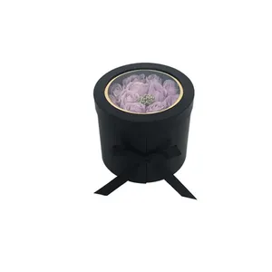 Luxury floral <b>gift</b> packaging in circular paper <b>boxes</b>, customizable according to needs - Product Image 1