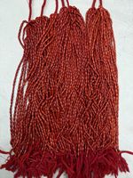 Perles de pierres précieuses de corail naturel en forme de riz rouge de sang de boeuf perles de pierres précieuses de corail italien naturel produit en vrac fait à la main
