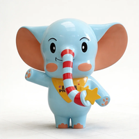 Sculpture géante en fibre de verre d'éléphant de dessin animé, mascotte mignonne, statue de personnage d'éléphant bleu pour centre commercial, place publique, parc d'attractions pour enfants