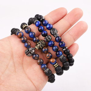 Di Yiwu Fabbrica di Gioielli Affittare Che Fanno Pietra Lavica Naturale Blu Occhio di <span class=keywords><strong>Tigre</strong></span> In Rilievo In Acciaio Inox Fascino Del Cranio Braccialetto Elastico Degli Uomini - Product Image 6