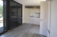 Construction modulaire préfabriquée Logements modulaires Maisons en paquet plat Maisons préfabriquées Maison de jardin moderne noire Cabine préfabriquée