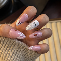 Faux ongles à presser en amande, couleur nude, avec motif fantôme, araignée et goutte de sang pour un style de fête effrayant et mignon