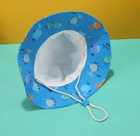 Venta al por mayor personalizado ajustable niños a prueba de viento malla sombrero para el sol protección UV verano niños sombrero de ala ancha cubo con correa