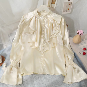 เสื้อผู้หญิงแฟชั่นฤดูร้อน แขนบานเงา ทรงหลวม สีพื้น แต่งระบาย คอตั้ง ติดกระดุมแถวเดียว - Product Image 1