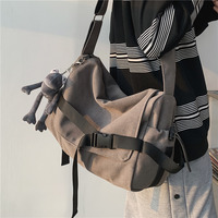 Sac bandoulière en toile grande capacité unisexe, motif géométrique, style décontracté pour étudiant, idéal pour livres