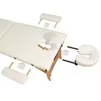 Table de massage pliable portable en cuir synthétique moderne de haute qualité, confortable et durable, idéale pour les salons de beauté, les spas et les massages thaïlandais.