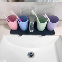 Tapis de robinet en silicone, support pour éponge et savon à vaisselle, protection anti-éclaboussures en silicone pour évier, pour comptoir de cuisine et salle de bain