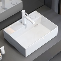 Lavabo de salle de bain en céramique blanche à poser sur comptoir D5040 avec vidange à droite pour projet hôtelier