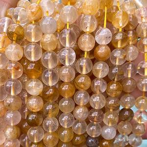 Vente en gros de brins de perles de guérisseur doré en cristal naturel utilisés pour le traitement du bracelet en cristal de guérisseur doré - Product Image 2