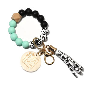 Siliconen kralen armband sleutelhanger voor vrouwen, schattig boho kwastje auto polsbandje sleutelring met MAMA ronde houten hanger - Product Image 5