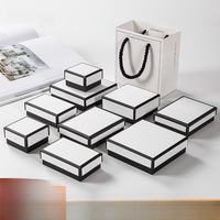 Boîte d'emballage de luxe en gros pour bijoux blancs, boîte cadeau en carton avec bordure noire pour bague et collier, personnalisation de marque
