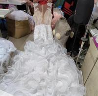 Robe de reine africaine 2025 en dentelle brodée de perles de luxe | Illusion voir à travers le dos et la queue de poisson à volants en cascade pour les mariées royales