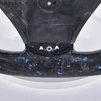 Volant sport Kryvex pour modèles LED en fibre de carbone forgée et cuir, avec couleur et surpiqûres personnalisables