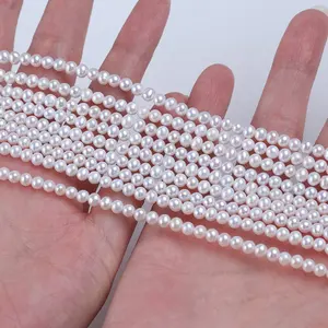Filo di perle d'acqua dolce sciolte di forma rotonda AK bianco naturale per la creazione di gioielli