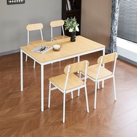Vente directe usine : Ensemble table et chaises de salle à manger rectangulaire moderne et minimaliste en acier et bois, quatre places, avec espace de rangement compact