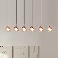 Lustre décoratif moderne nordique à bulles avec boule dorée et globe suspendu pour table à manger et salon
