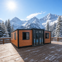 Maison pliante à double aile de 20 pieds, finition bois, extensible, préfabriquée, type conteneur, pour villas de villégiature modernes et cabines d'hôtel
