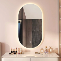 Nouveau miroir intelligent LED ovale mural sans cadre anti-buée moderne et personnalisé pour salle de bain et coiffeuse