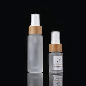 Bottiglia di alta qualità da 50ml di lozione cosmetica di bambù in vetro smerigliato bottiglie di cosmetici di bambù bottiglia di vetro Spray con tappo di bambù