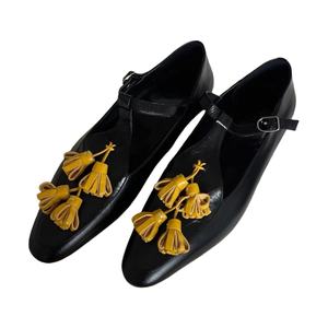 Las últimas Sandalias planas para mujer 2025, Sandalias planas cómodas Vintage con logotipo personalizado, bailarinas con correa en T y zapatos con borlas <span class=keywords><strong>amarillas</strong></span> - Product Image 1
