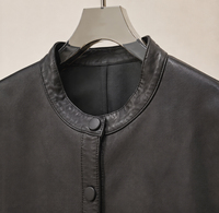 Veste en cuir d'agneau véritable pour femme, col rond, boutonnée, coupe courte, poches plaquées, style vintage