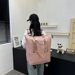 Sac à dos de voyage avec roulettes pivotantes, grande capacité, sac de sport extensible pour étudiants, séparation sec/humide pour courts séjours - Product Image 1