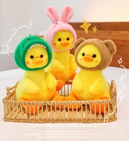 Nouveau canard jaune dinosaure jouets en peluche mignon dessin animé peluche oreiller doux coton PP remplissage en gros filles cadeau d'anniversaire