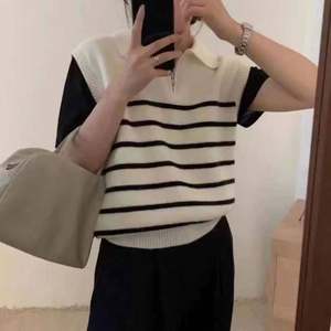 Suéter sin mangas y chaleco de punto a rayas con cremallera y cuello retro para mujer, estilo casual minimalista, para uso diario. - Product Image 5