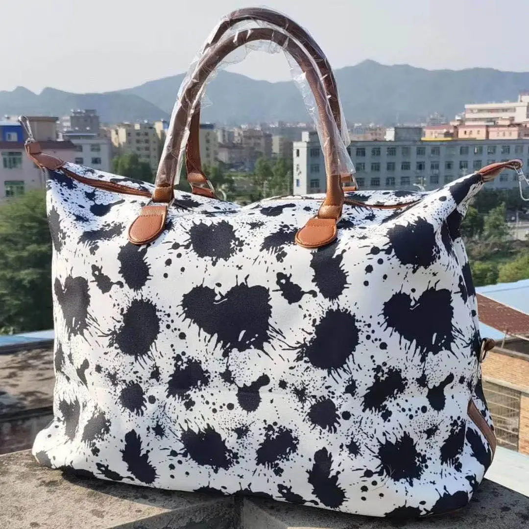 Vente en gros Sacs de voyage Weekender en cuir de vachette Sac à main en cuir à carreaux de buffle imprimé vache de grande capacité Sac de sport léopard pour femmes