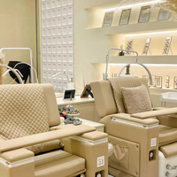 Fauteuil de pédicure multifonctionnel inclinable avec massage et bain de pieds, idéal pour salon de manucure, institut de beauté et espace de relaxation.