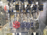 Machine automatique de haute précision à 4 buses, contrôlée par PLC, pour huiles moteur, shampoings, poudres, lubrifiants, huiles de frein et huiles de moteur (YB-J4B)