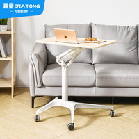 Bureau portable à roulettes avec design modulable, table de travail et d'étude réglable en hauteur pneumatiquement pour canapé