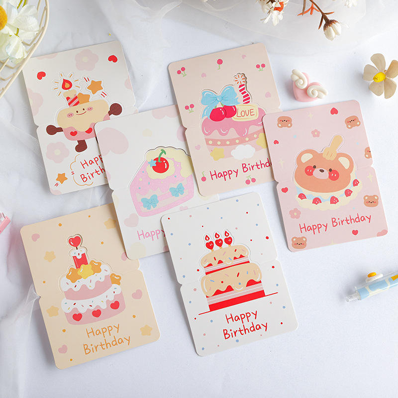 Biglietto d'auguri rosa con simpatico animaletto.