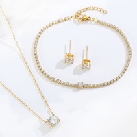 Ensemble de bijoux en zircon classique en acier inoxydable or 18 carats pour femmes boucles d'oreilles et collier pour cadeau d'anniversaire en gros