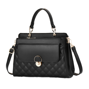 Sac à main décontracté QAZA 2024 pour femme en cuir PU de luxe avec bandoulière en PVC, imperméable, avec fermeture éclair et rivets décoratifs, vente en gros - Product Image 1