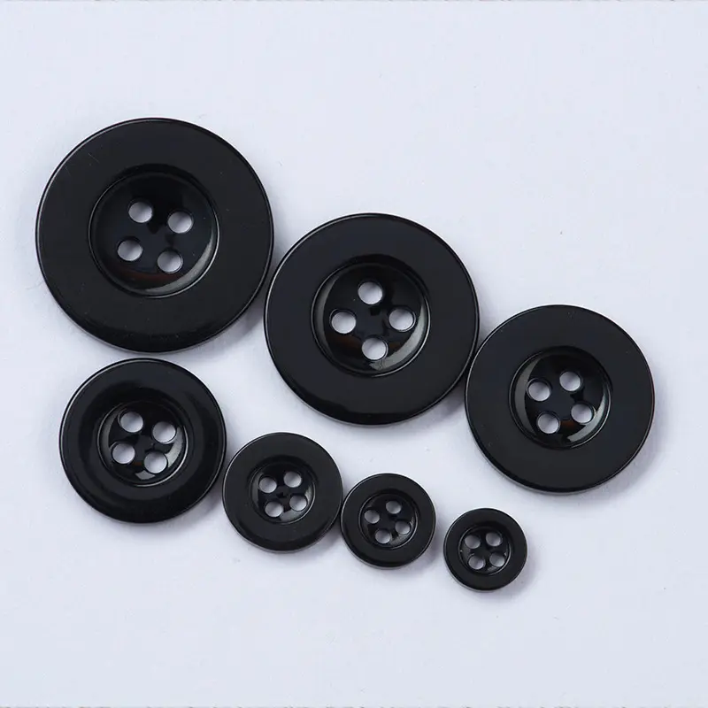 Black and white four-eye resin buttons with thin edges