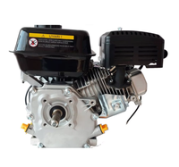 Moteur industriel OHV de 390 cm³ alimentant une machine à souder, sans besoin d'alimentation électrique, pour utilisation sur les chantiers de construction au Ghana.