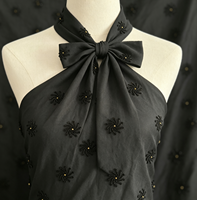 Tissu TC noir A087 avec motif floral en spirale noir-doré pour robes de soirée et robes