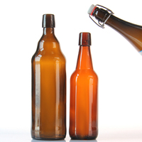 Bouteilles de bière en verre de forme personnalisée de luxe de 330Ml 640Ml pour la mise en bouteille de la bière