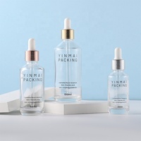 Offre Spéciale 30ML 1OZ flacon compte-gouttes de mesure en verre transparent cosmétique vide 50ML flacon d'huile essentielle avec Pipette en verre