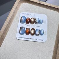 Nouveau produit lancé, ongles press-on faits main de luxe, noir et or, marron café, plaqués or, motif floral scintillant œil-de-chat, pur artisanat