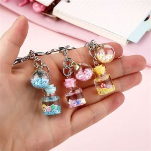 Porte-clés liquide en acrylique avec sable mouvant pour femme, pendentif de sac créatif et mignon pour couple, porte-clés flottant, cadeau - Product Image 4