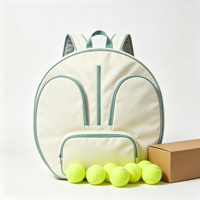 Sac à dos de tennis rond crème menthe, sac double pour raquettes avec deux poches avant pour raquettes, poche centrale zippée, bretelles rembourrées