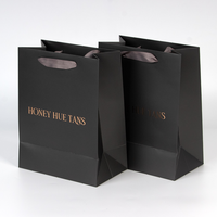 Sacs shopping en papier kraft noir avec poignée personnalisée, impression offset, cordon de serrage, carton ivoire, ruban pour chaussures et vêtements, sacs cadeaux