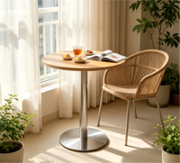 Table à manger ronde en bois minimaliste moderne pour usage en restaurant