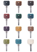 Prix de gros Porte-clés en cuir Porte-clés en cuir de luxe Porte-clés en cuir véritable imperméable pour maison