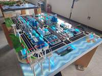 Maquette architecturale d'immeuble de bureaux vert avec éclairage LED