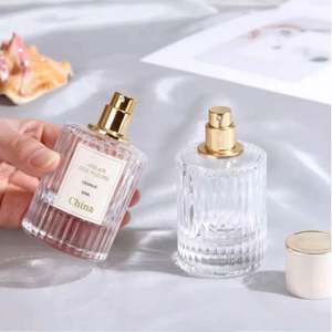 ขวดน้ำหอมแก้วฝ้าทรงกระบอกหนาใส ขนาด 30 มล. 50 มล. 100 มล. พร้อมกล่อง บรรจุภัณฑ์หรูหรา สกรีนโลโก้ตามสั่ง - Product Image 1