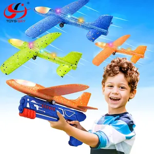 Venda quente 3 Pack Voando Avião Lançador Toy Gun LED Espuma Planador Catapulta Avião Brinquedo Para Crianças Esporte Ao Ar Livre Brinquedos Voadores