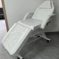 Table de massage et de beauté multifonction pliable avec trou pour le visage, porte-serviettes personnalisé et roulettes, idéale pour salon de beauté et tatouage